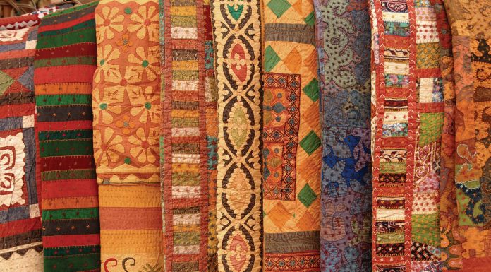 tapestries arranged in a line